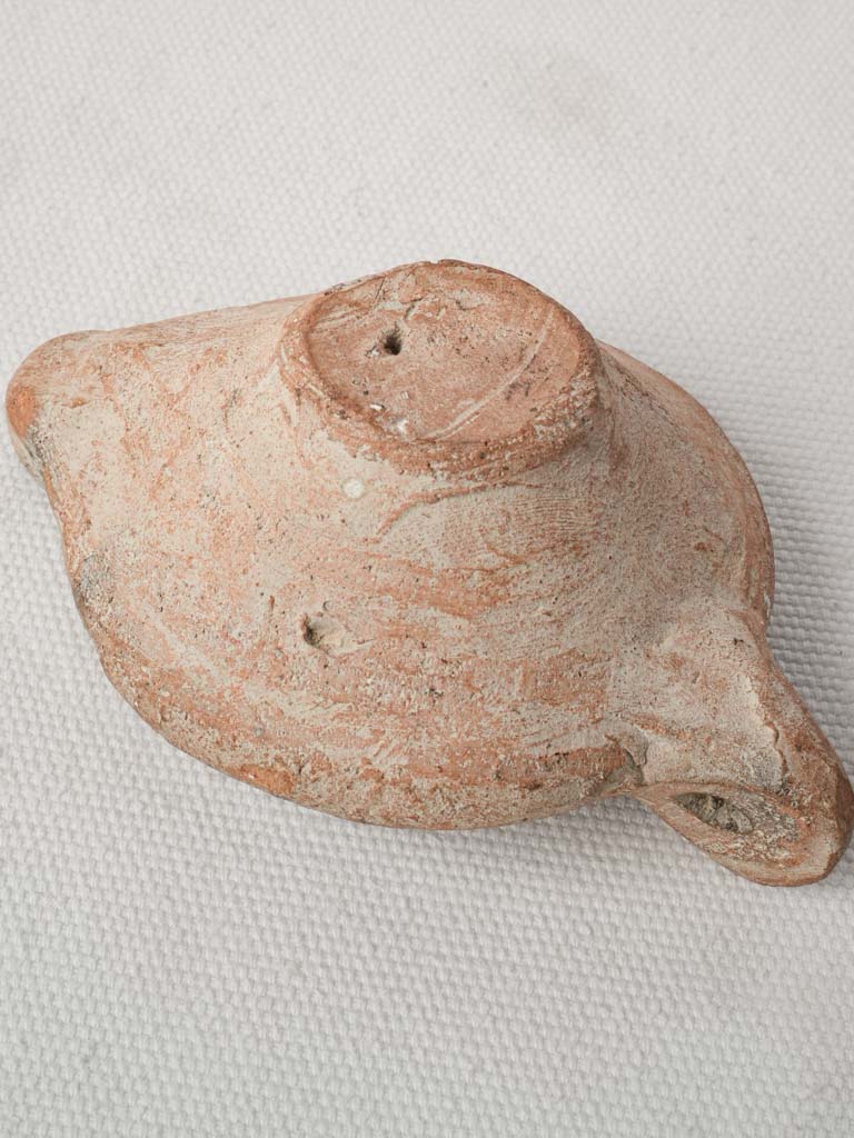 Sculptural low-relief patina lamp feature