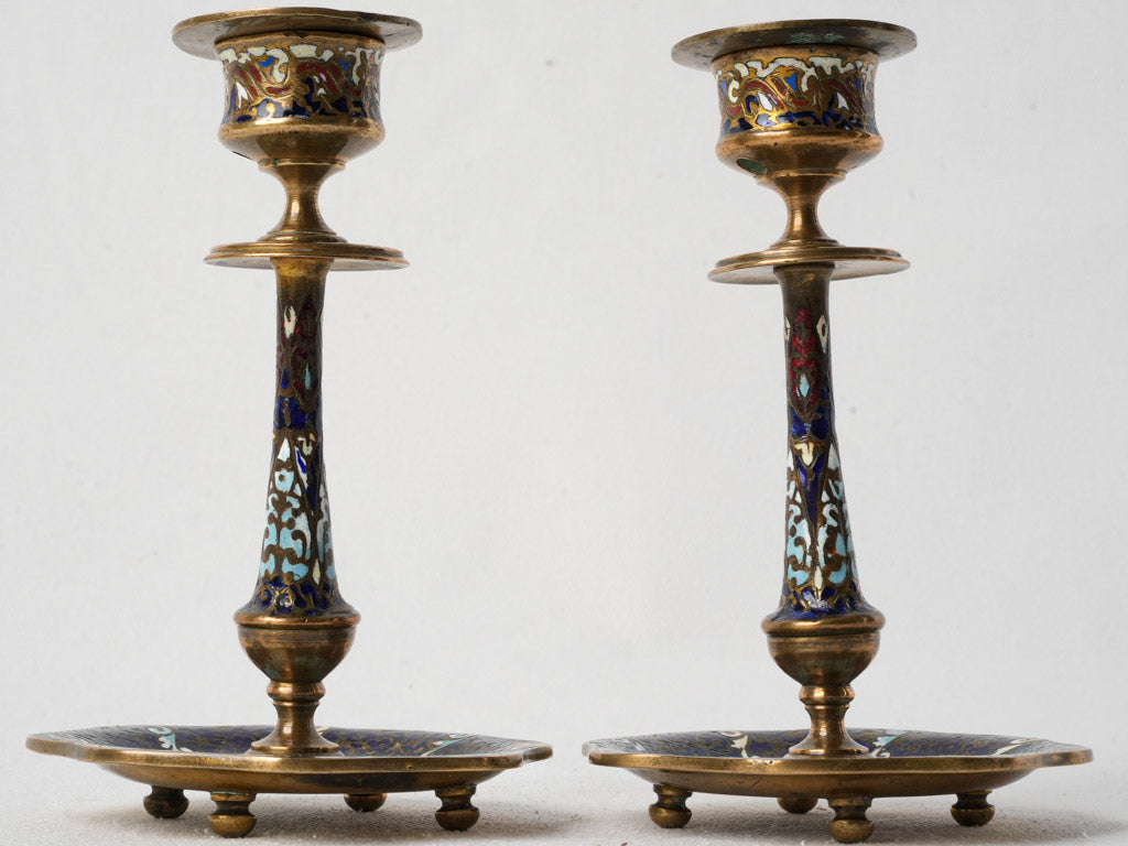 Rich polychrome enamel candlesticks  