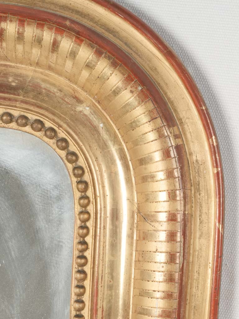 Warm, luxurious gold leaf mirror