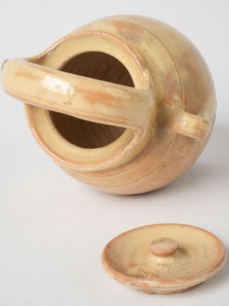 Mustard-colored late 19th-century water jug