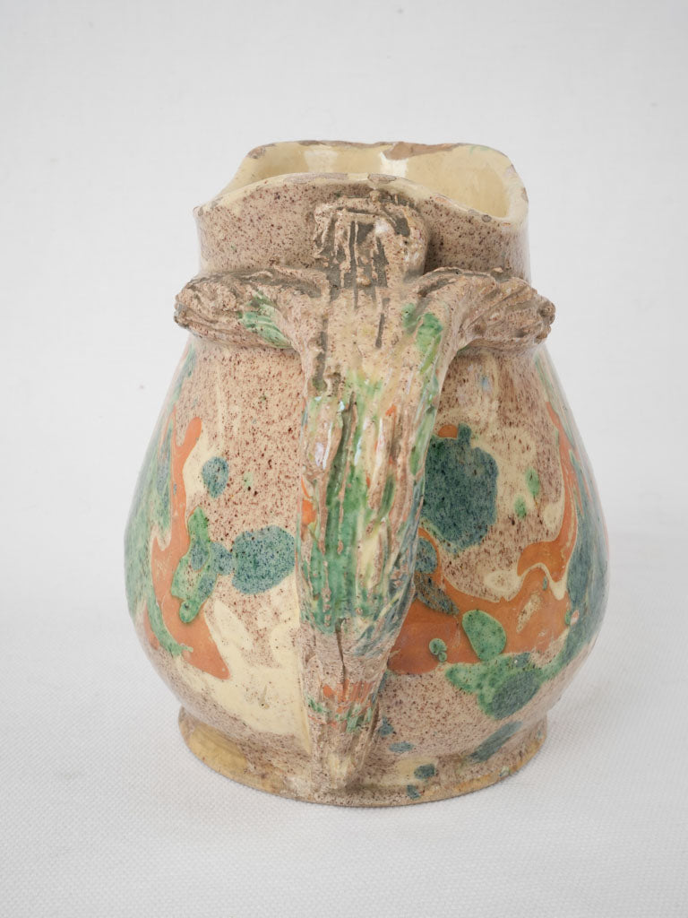 Orange blue-green accented antique vessel