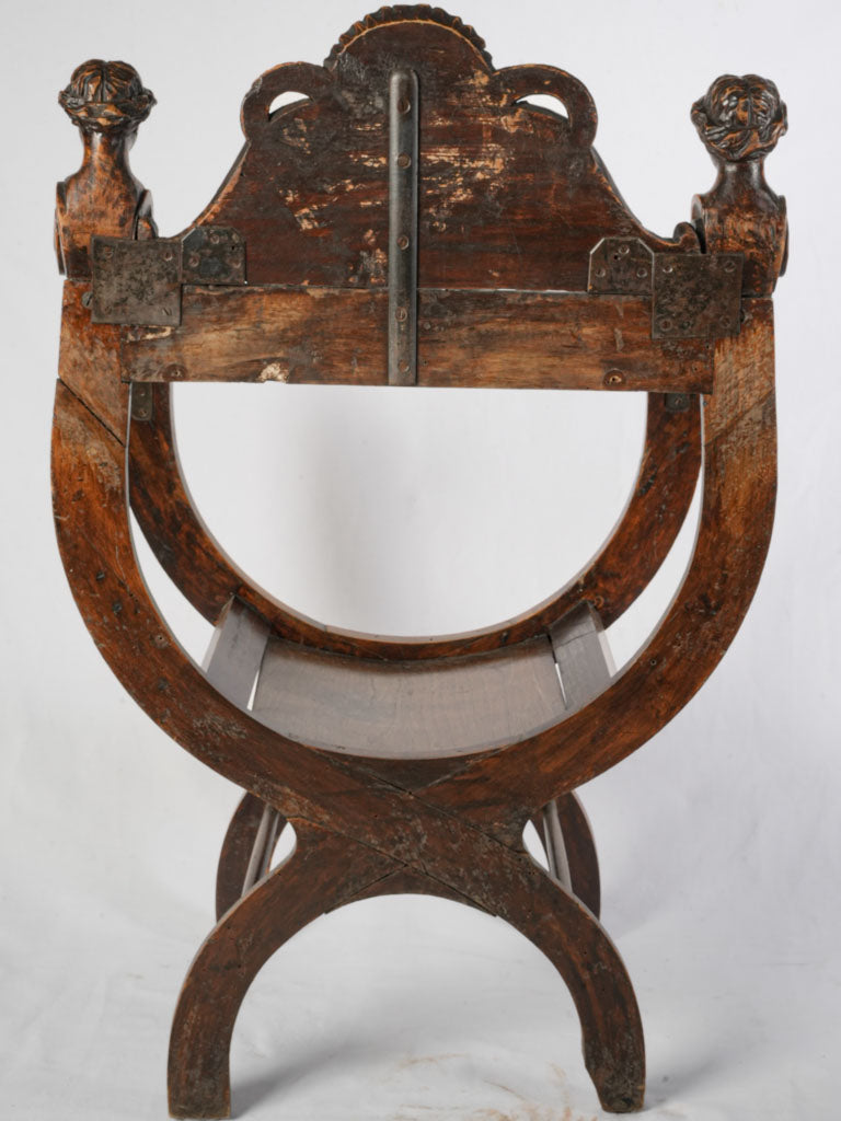 Grand ornate wooden armchair