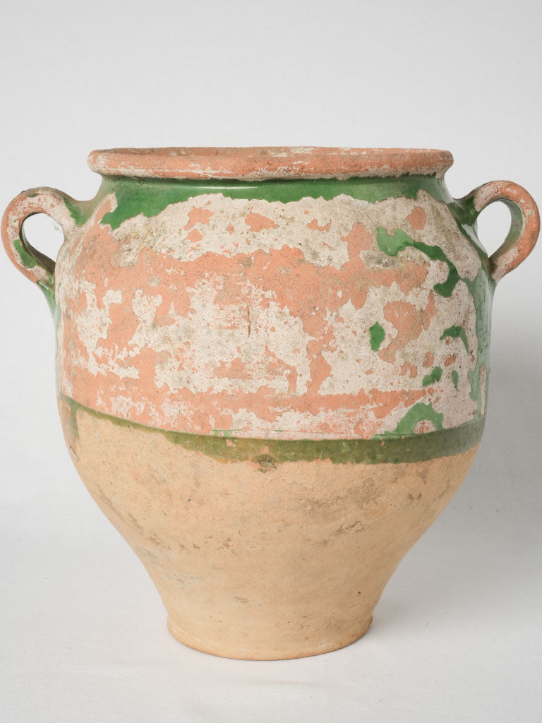 Distinct, crackled, green glazed confit pot