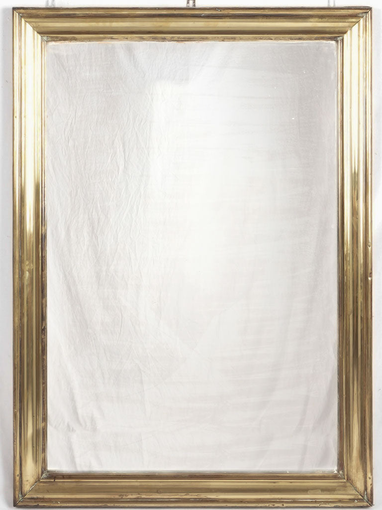 Antique French brass bistro mirror