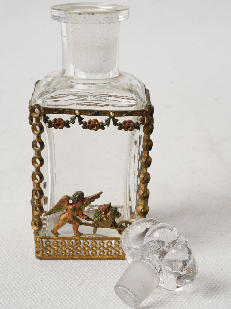 Romantic cherub decorated scent bottle