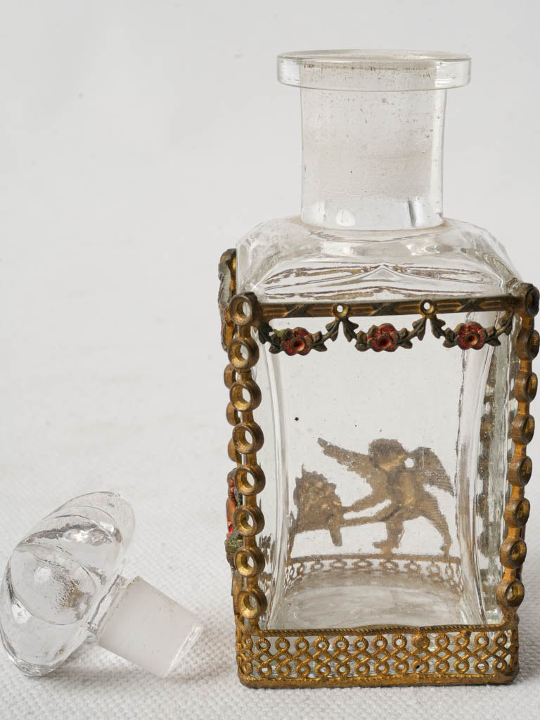 Intricate pierced ring scent bottle