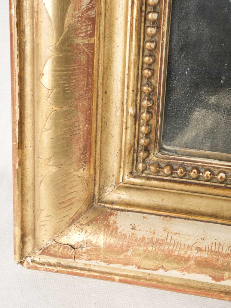 Intricate foliage motif mirror
