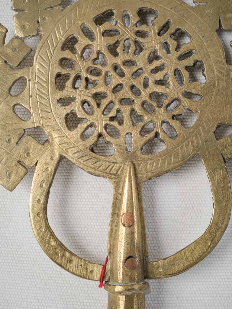 Artisanal copper-accented latticework cross