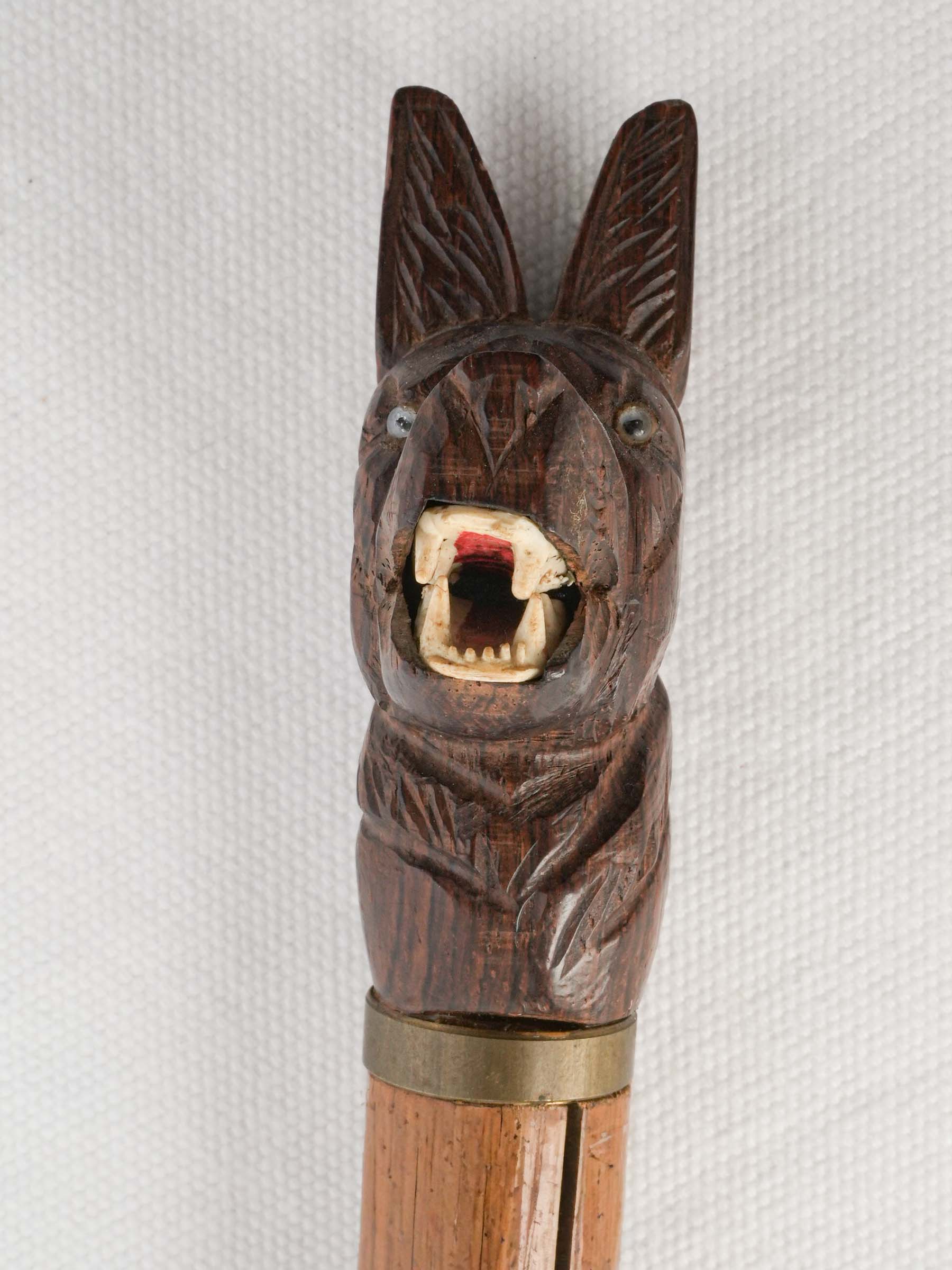 Naturalistic wooden wolf-head stick