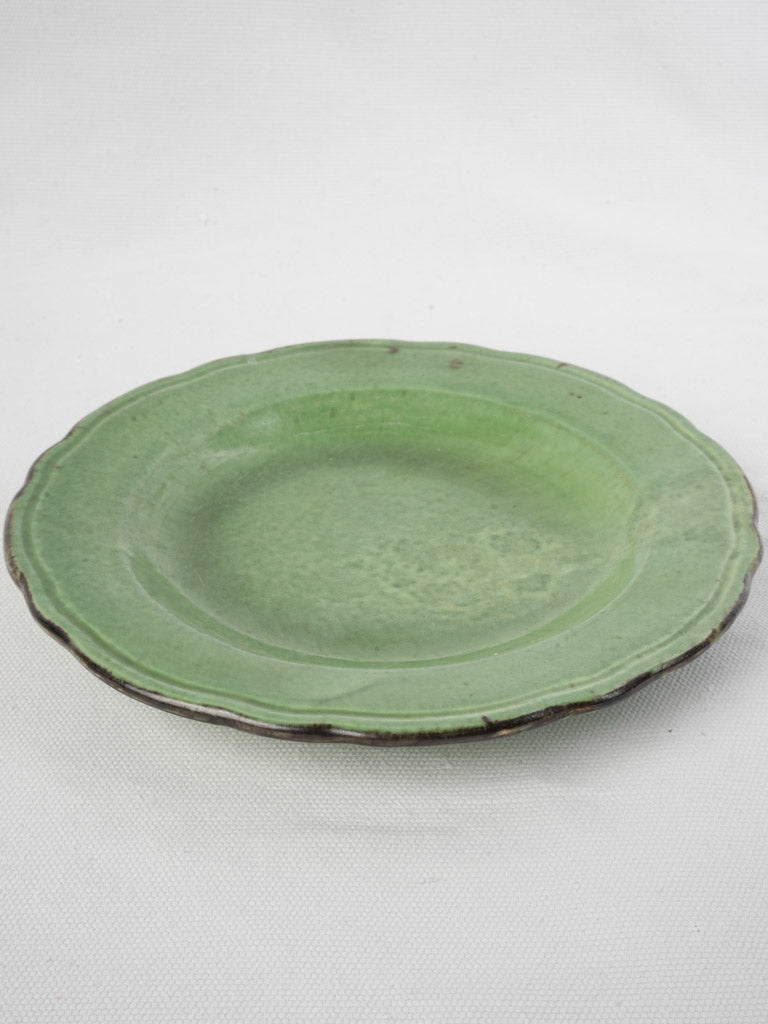 Antique copper-green earthenware plate