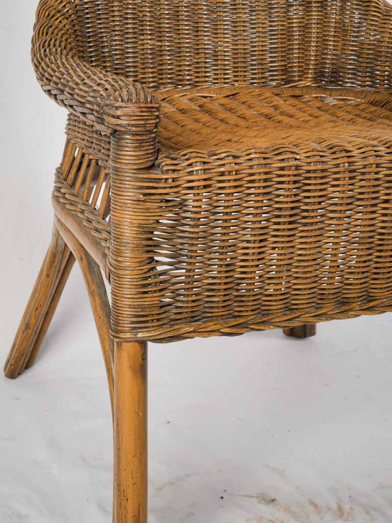 Sturdy woven rattan armchairs