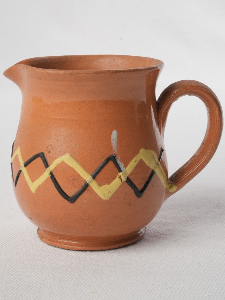Petite glazed ceramic creamer