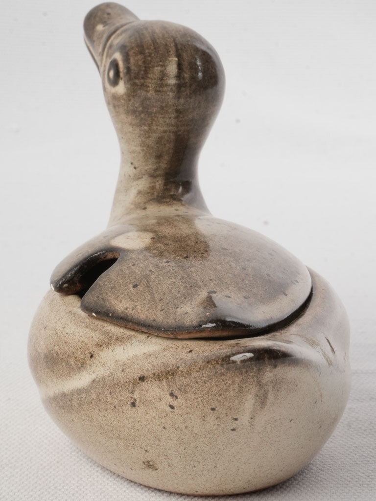 Decorative figural stoneware condiment holder