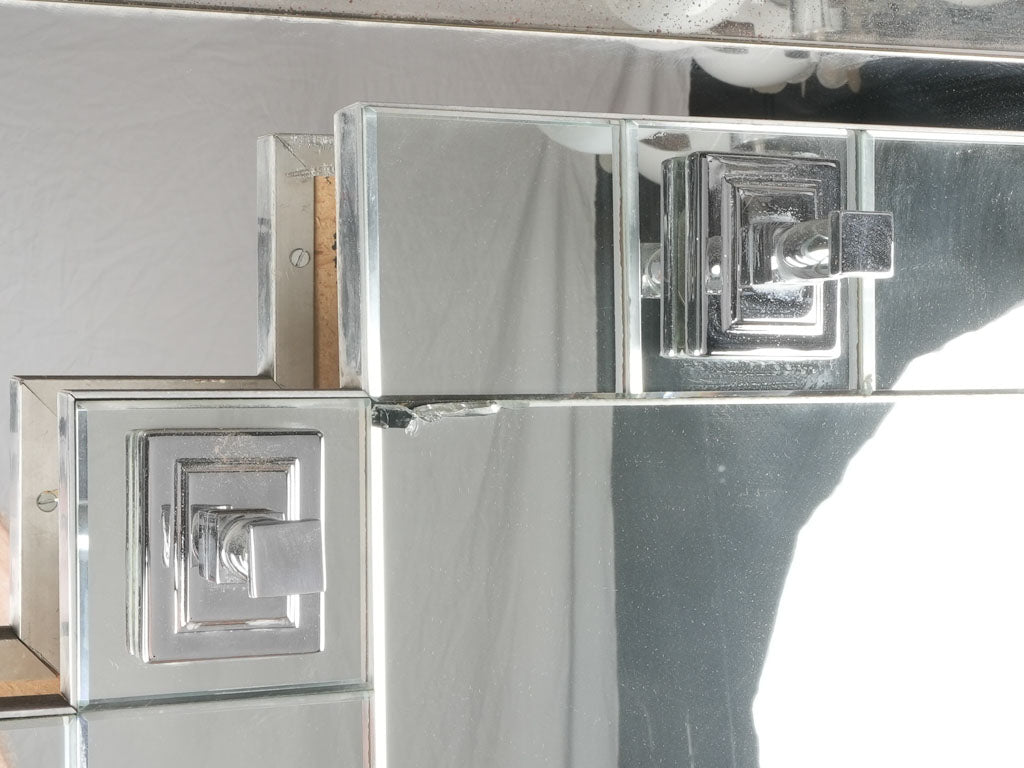 Elegant stepped-frame design conversation mirrors