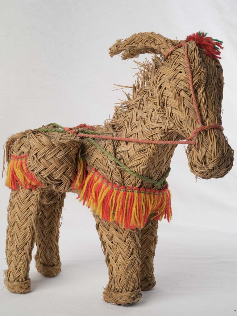 Vibrant woven grass donkey figurine