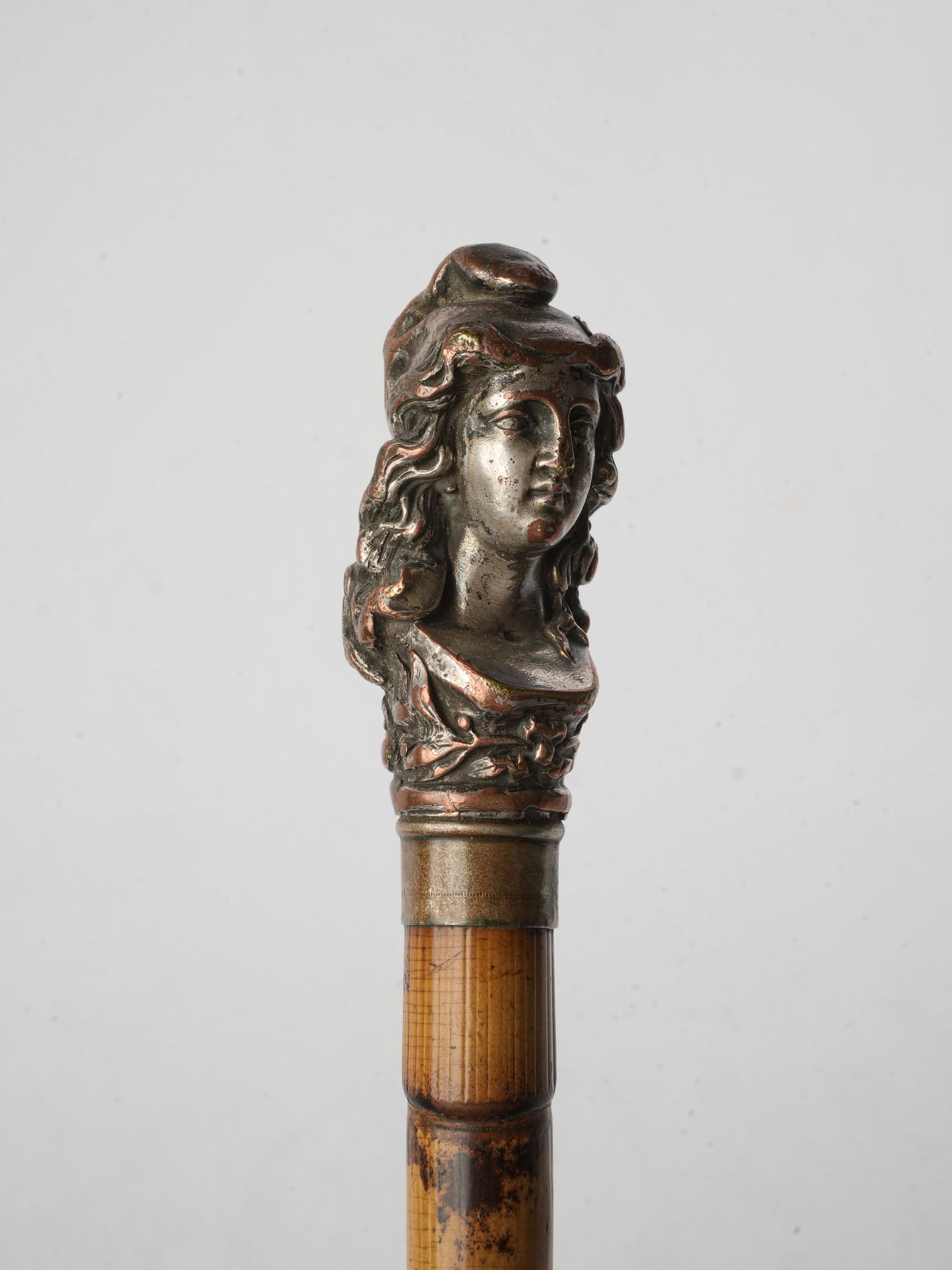 Antique bamboo cane with Marianne.