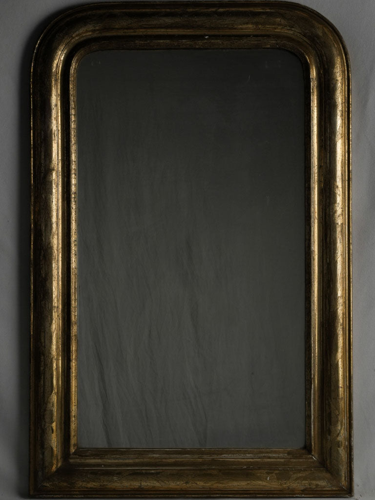 Charming, 19th century silver gilt mirror