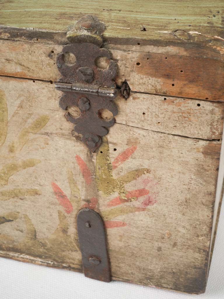 Antique crimson floral storage chest