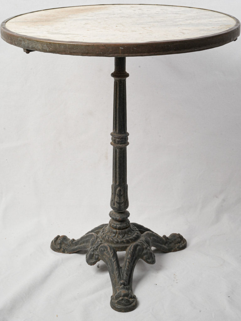 Ornate foliate cast iron table