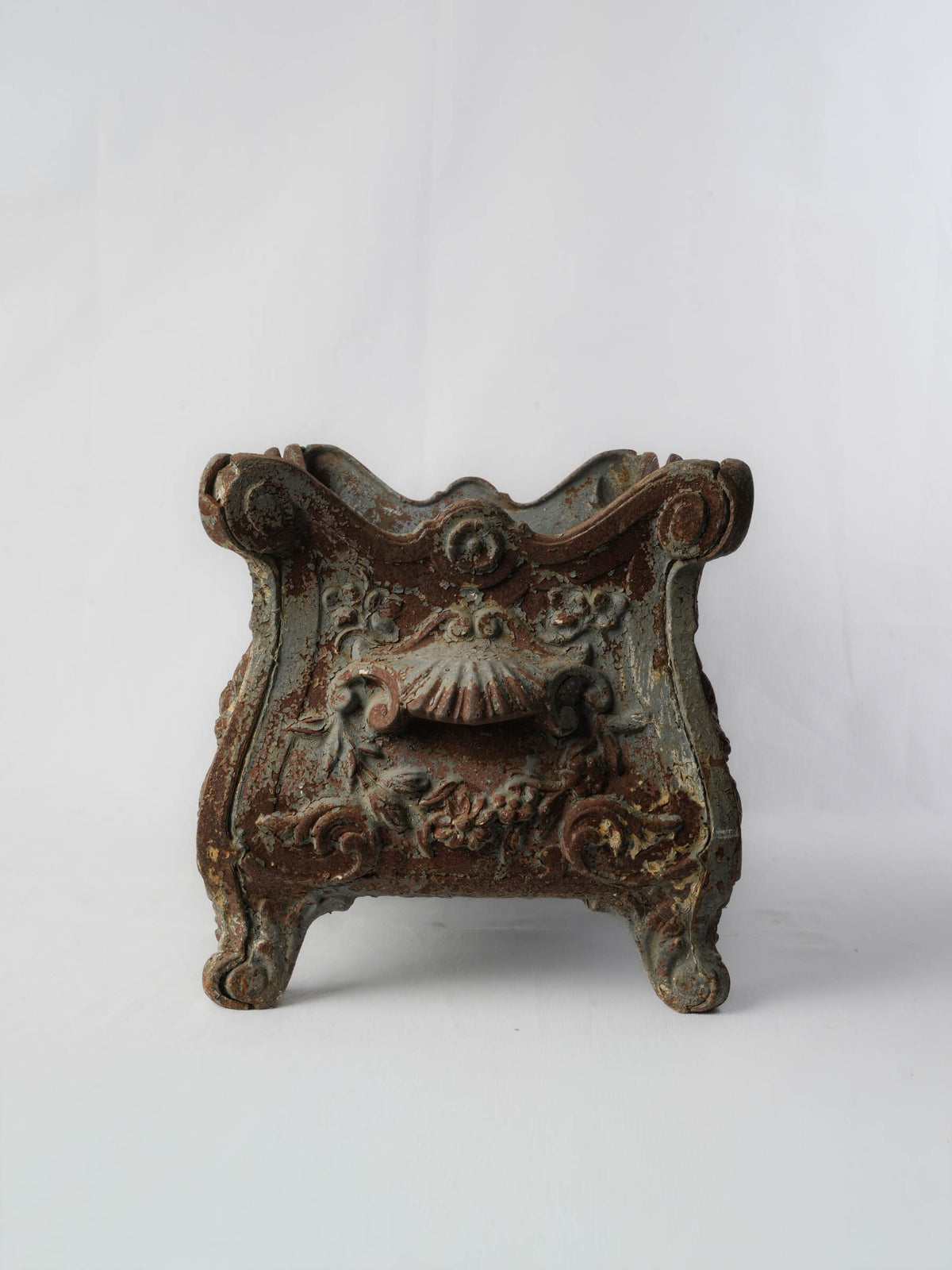 Ornate timeworn antique jardinieres