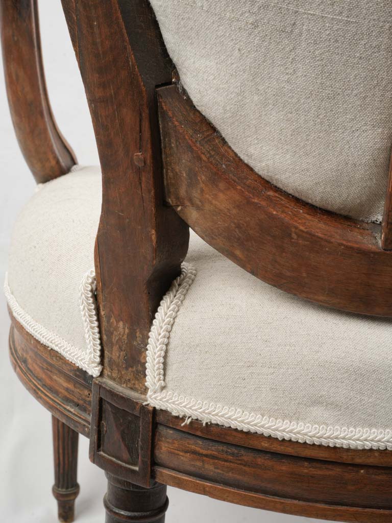 Symmetrical scroll-arm chair