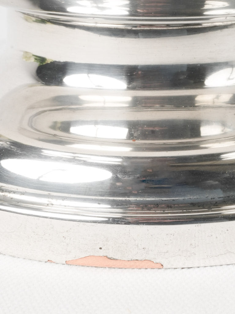 Copper-revealing vintage champagne bucket