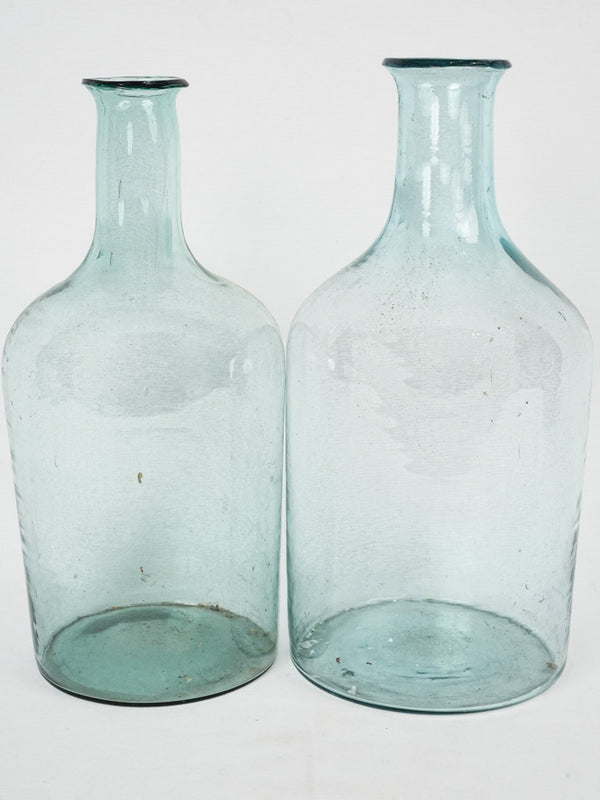 Antique hand-blown glass quetsche bottles