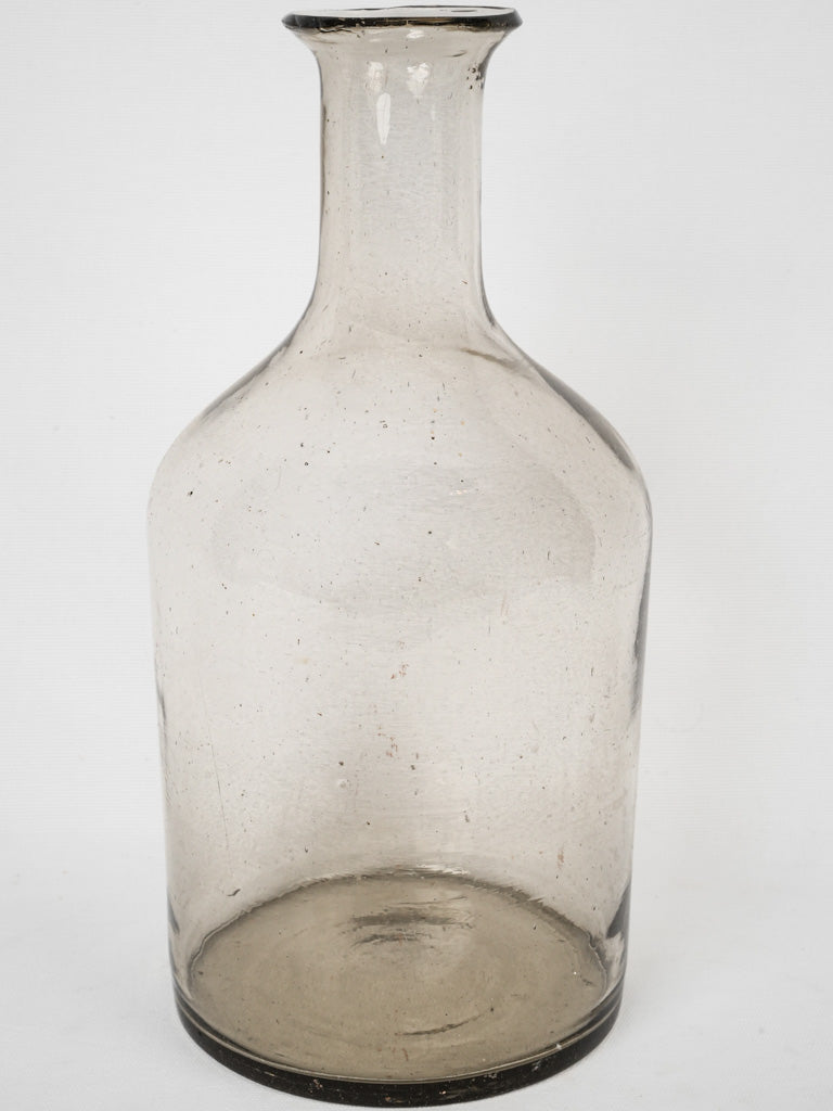 Crafted, historic 19th-century glass bottle