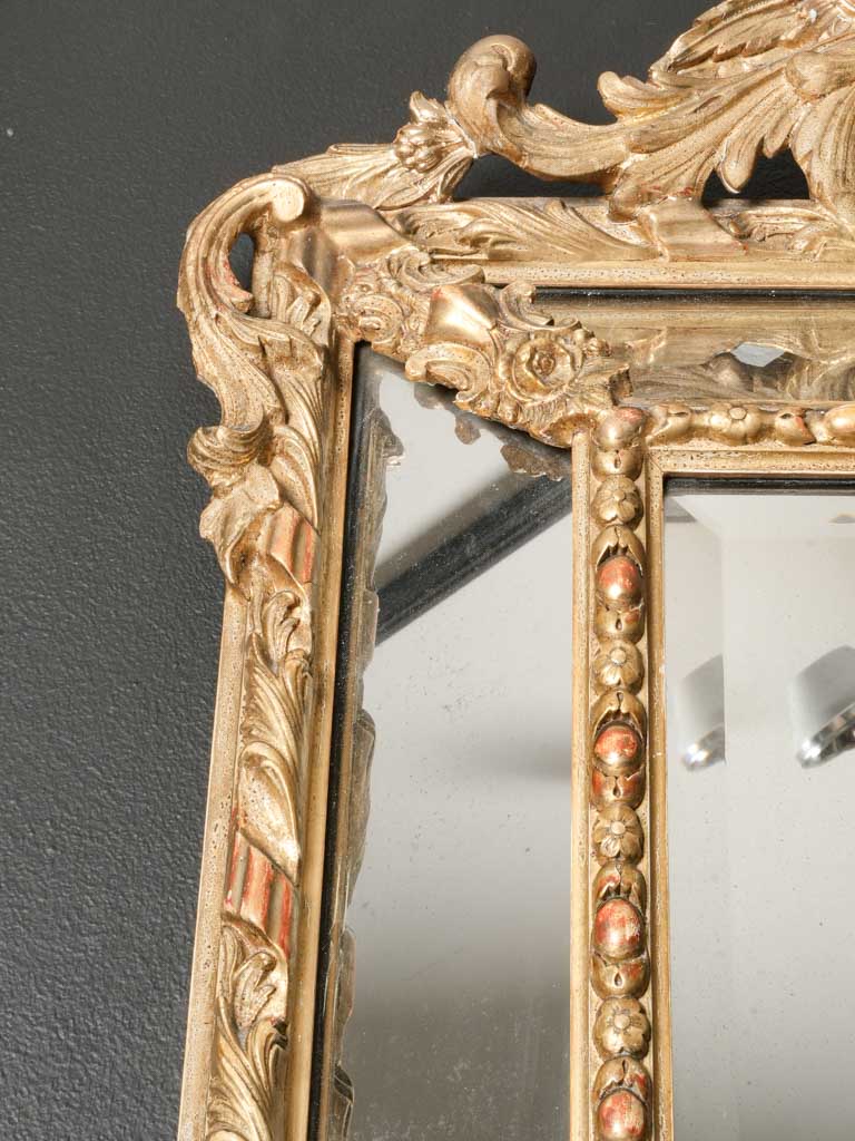 Sculptural luminous carved mirror giltwood