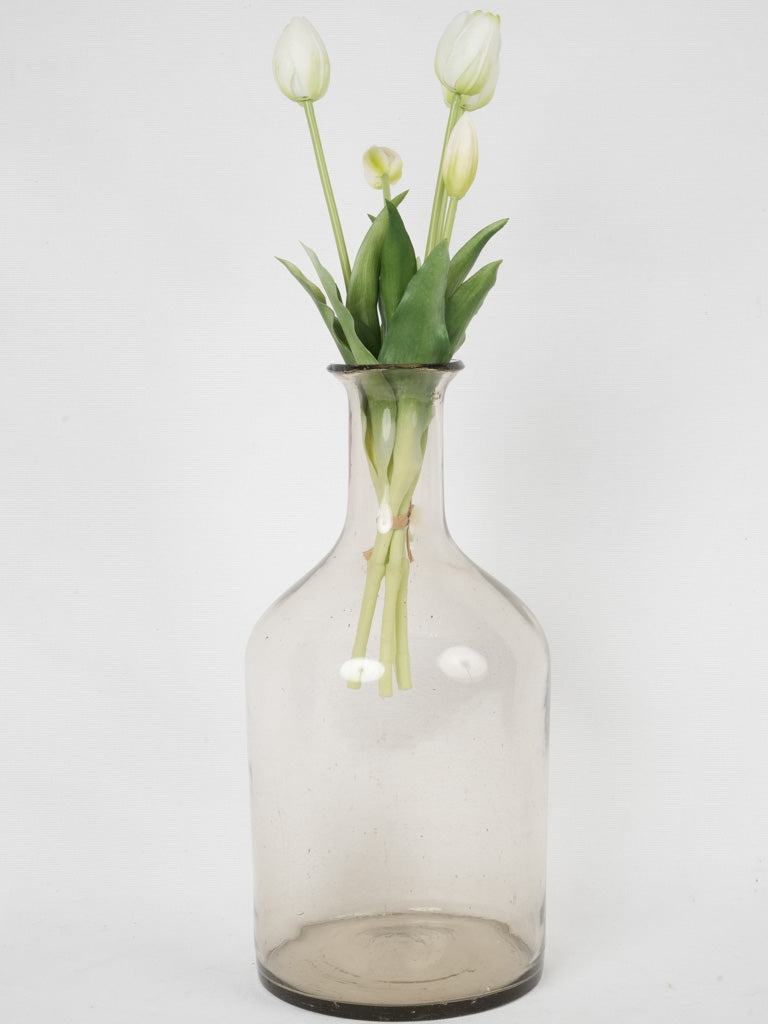 Distinctive, vintage purple quetsche alcohol bottle