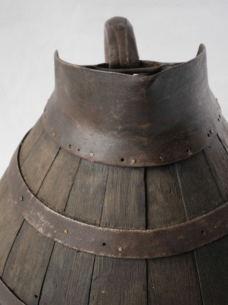 Iron-banded 19th-century pitcher