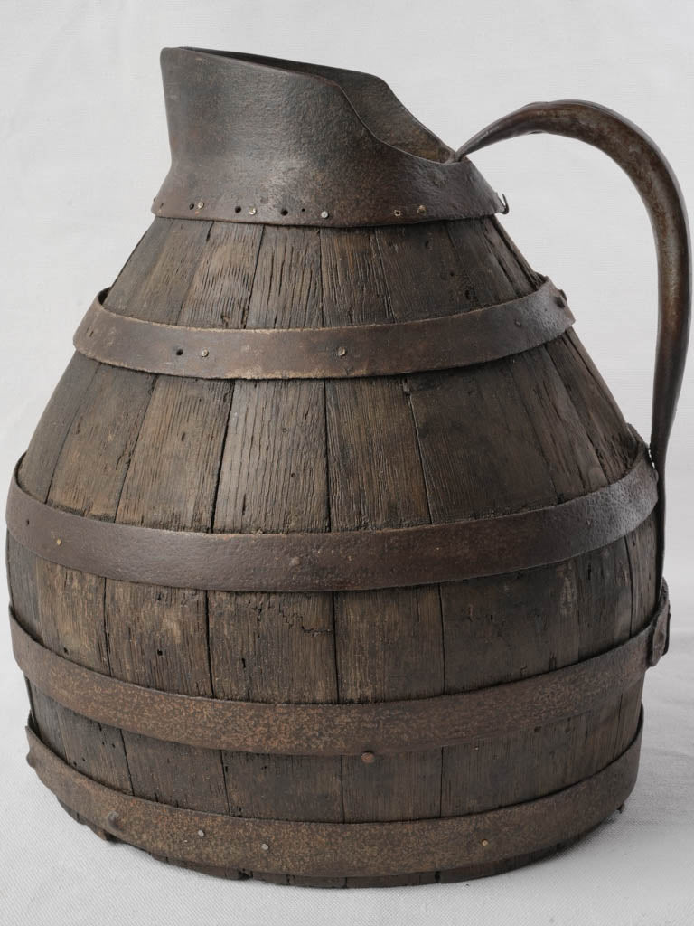 Aged handcrafted French wine pitcher