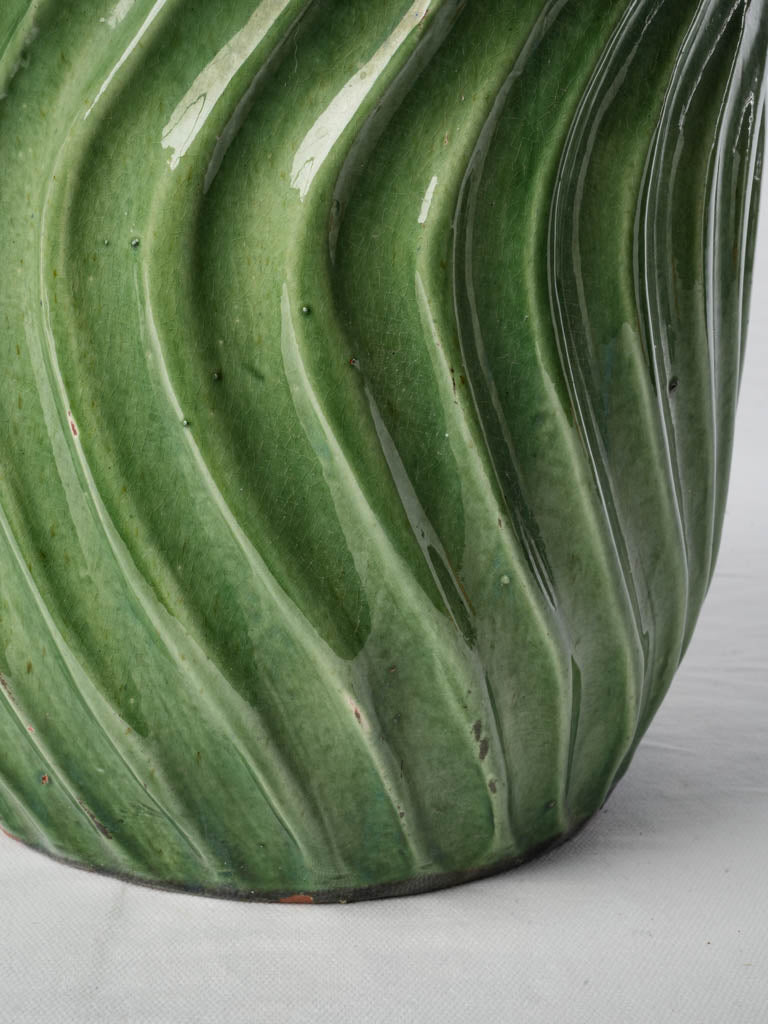 Tall sculptural green vase