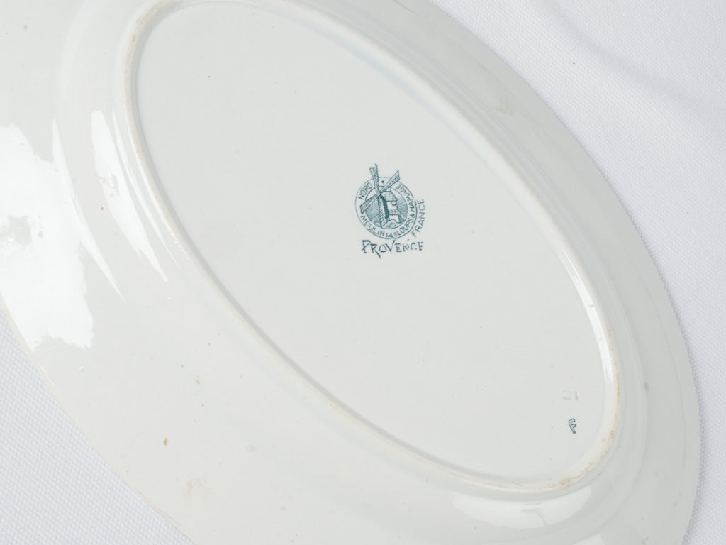 Artisanal Moulin des Loups ceramic dining ensemble
