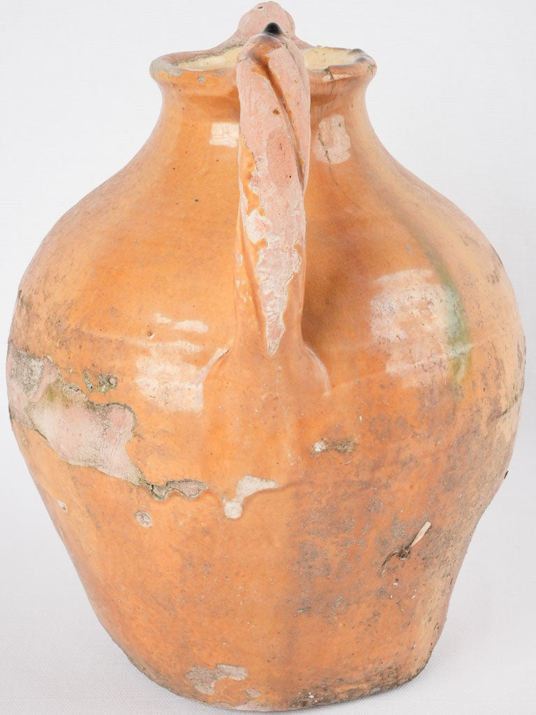 Rustic green-accented ceramic cruche