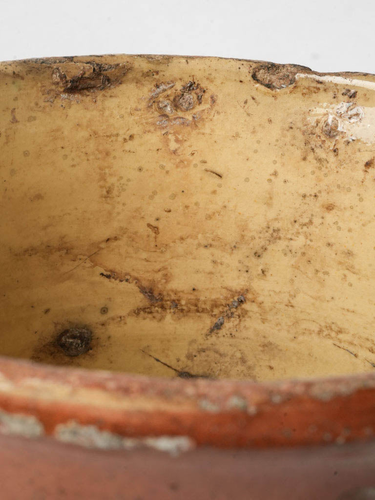 Timeworn decorative pottery vessel