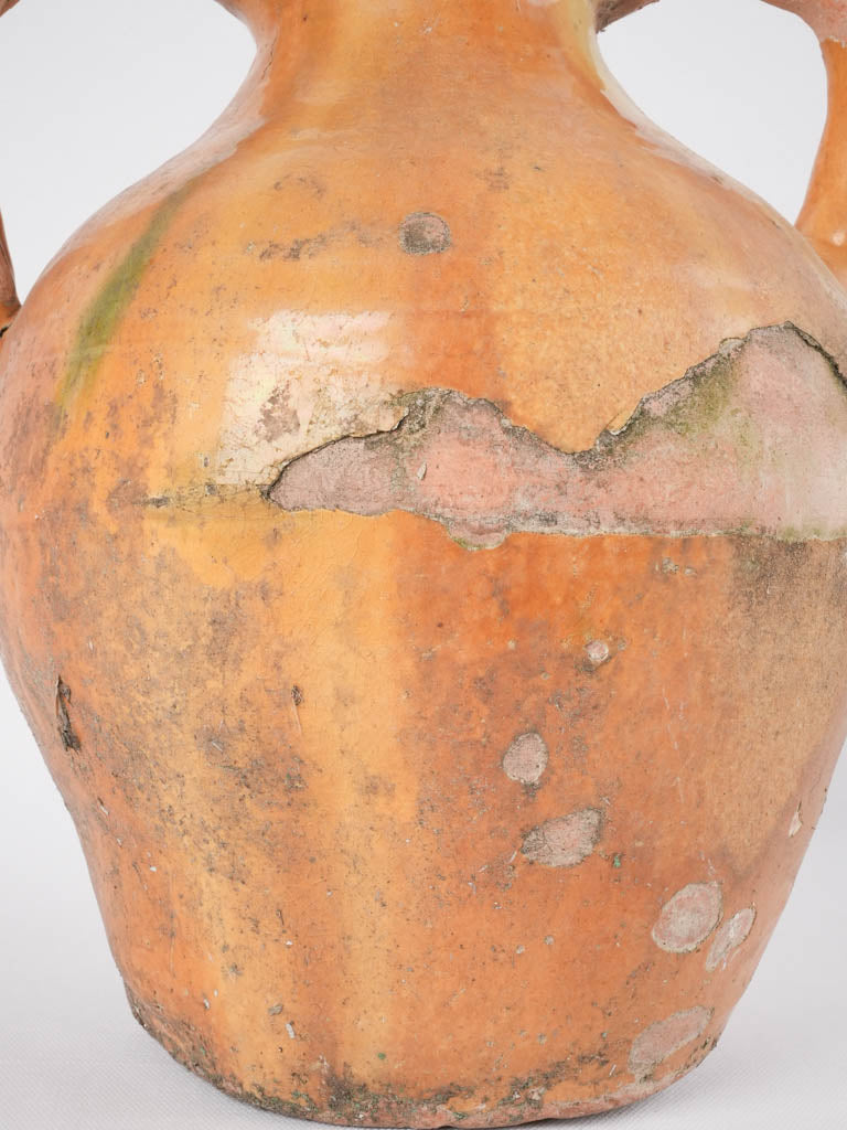 Lovely worn confit pitcher spout