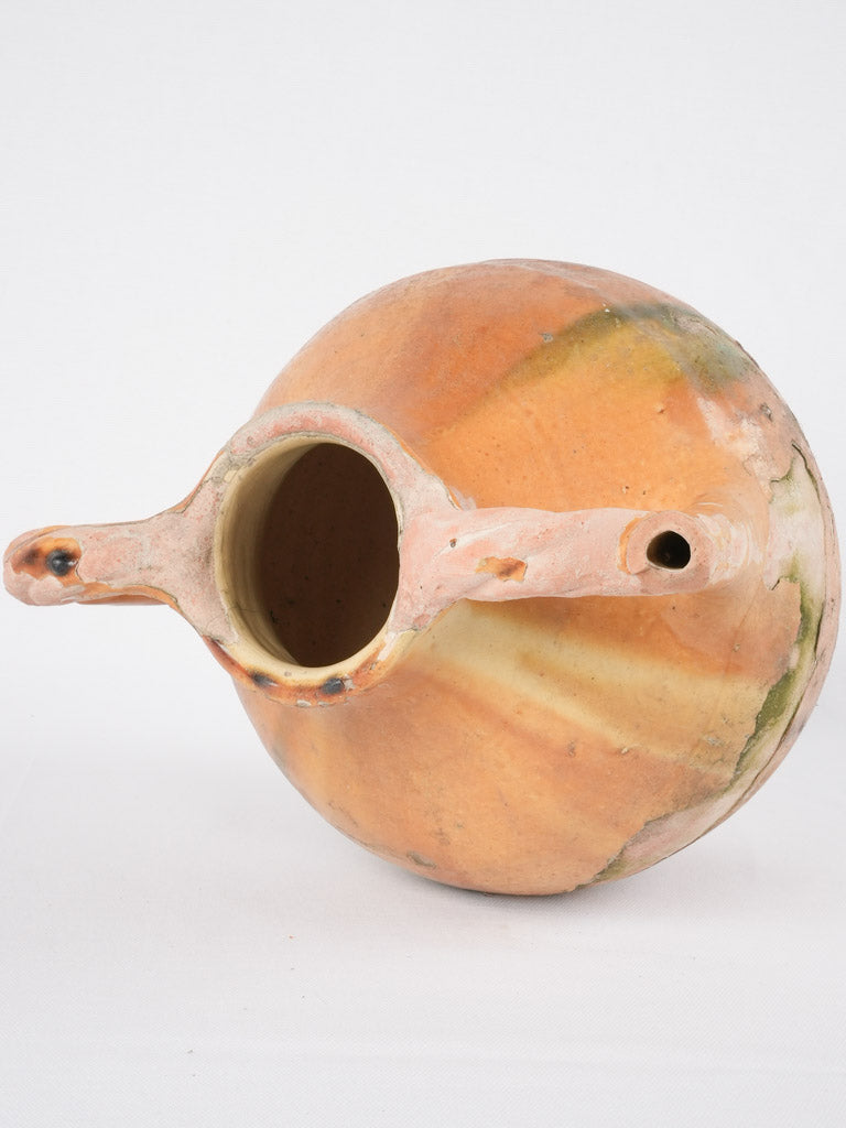Weathered traditional ocher-glazed pot