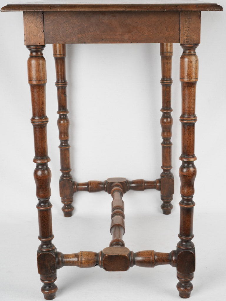 Intricately carved antique bedside table
