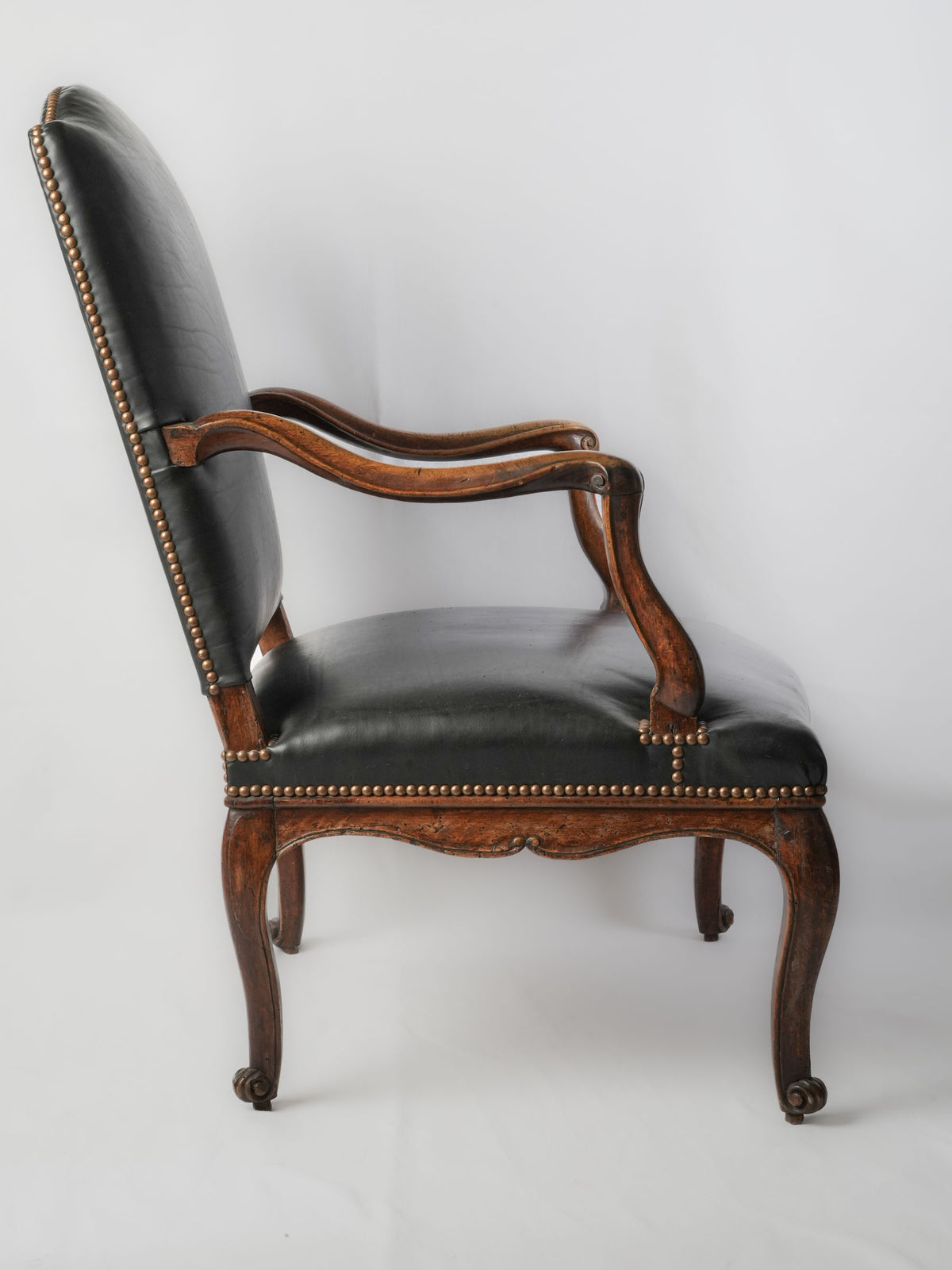 Refined carved walnut chair