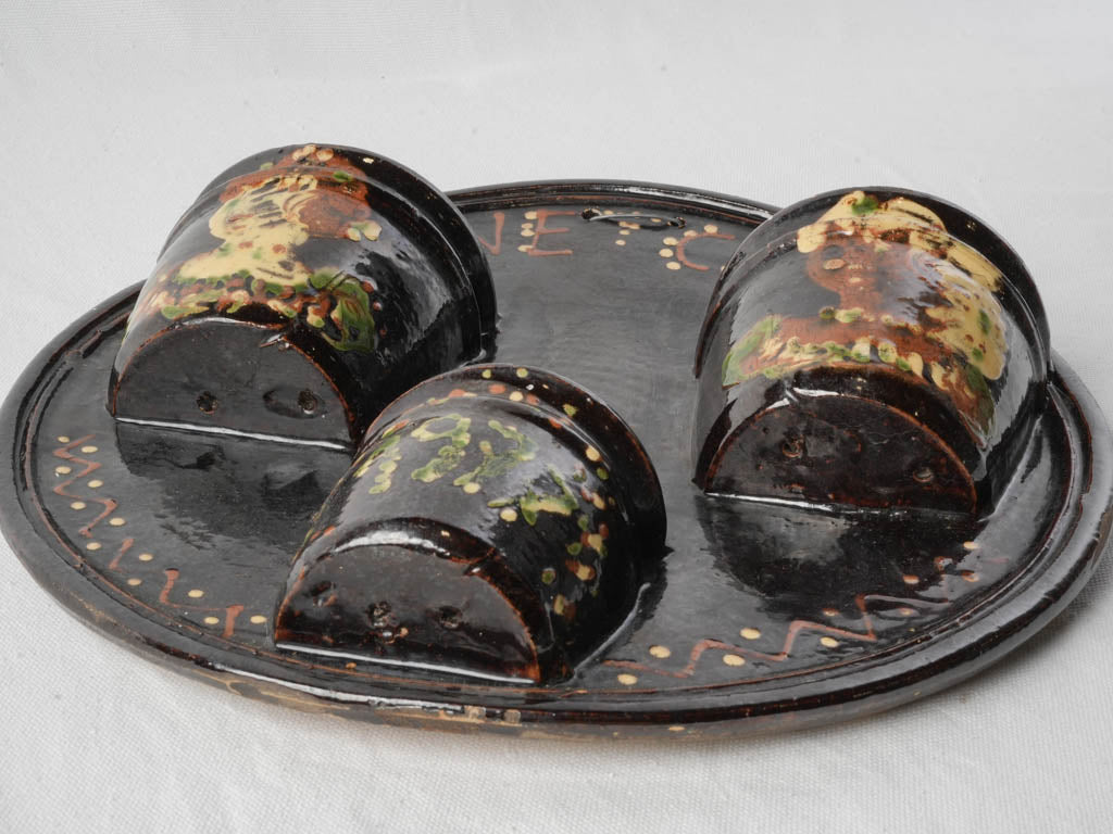 Historically styled cutlery strainer