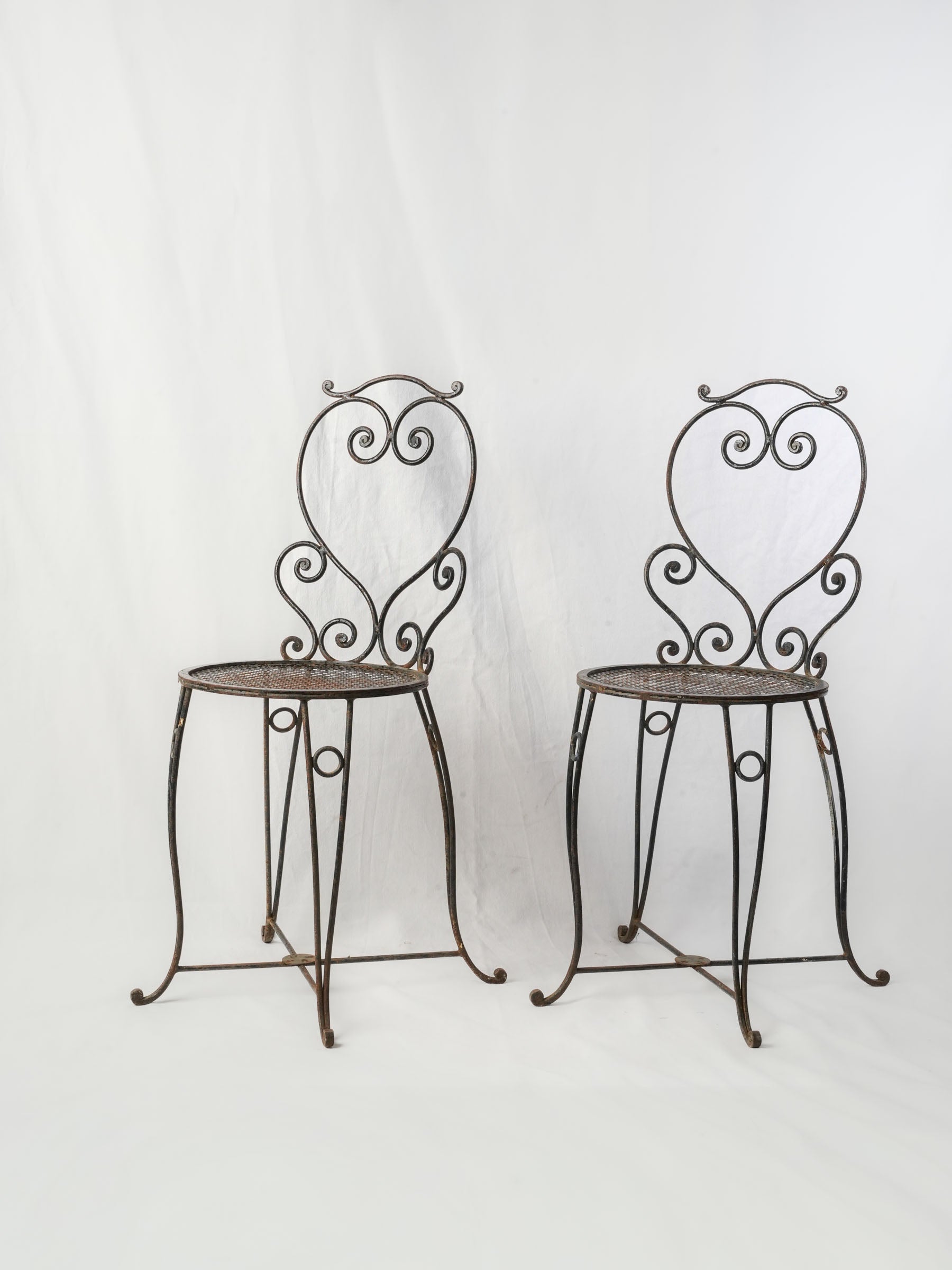 Pair of Small French Wrought Iron Garden Chairs w/ Scrolling Motifs