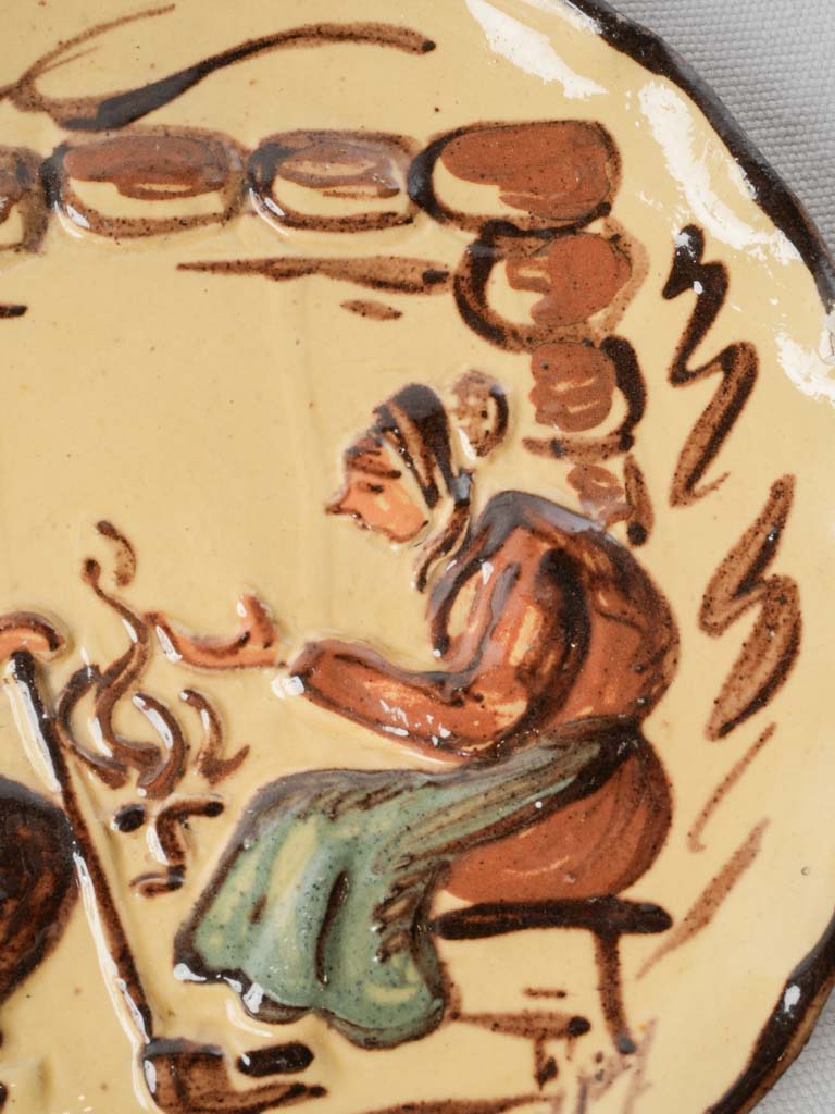 Scalloped-edge relief ceramic plate