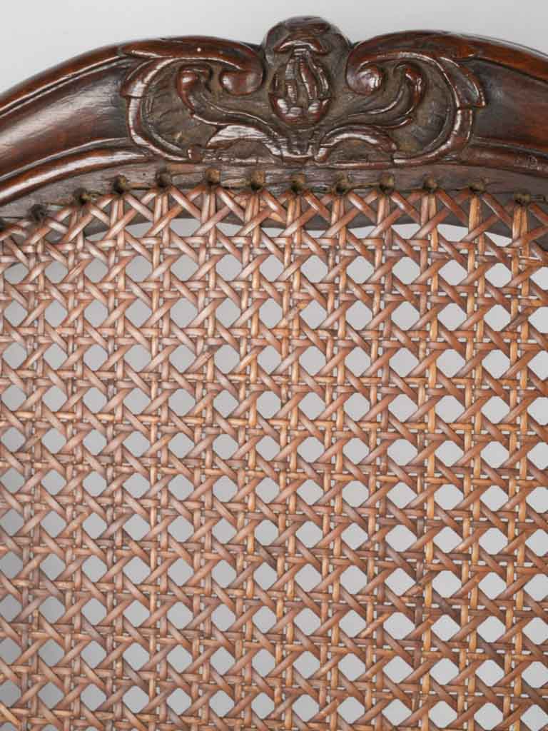 Intricately carved walnut cane chairs