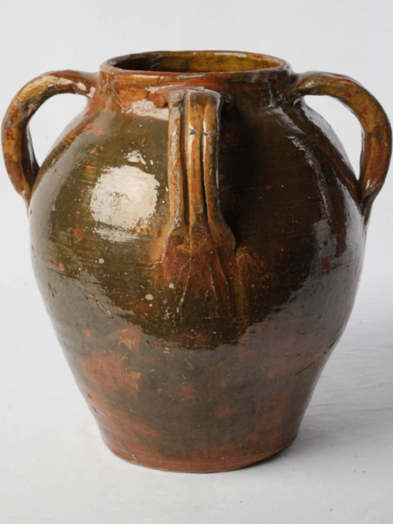 Aged artisanal textured handled jar