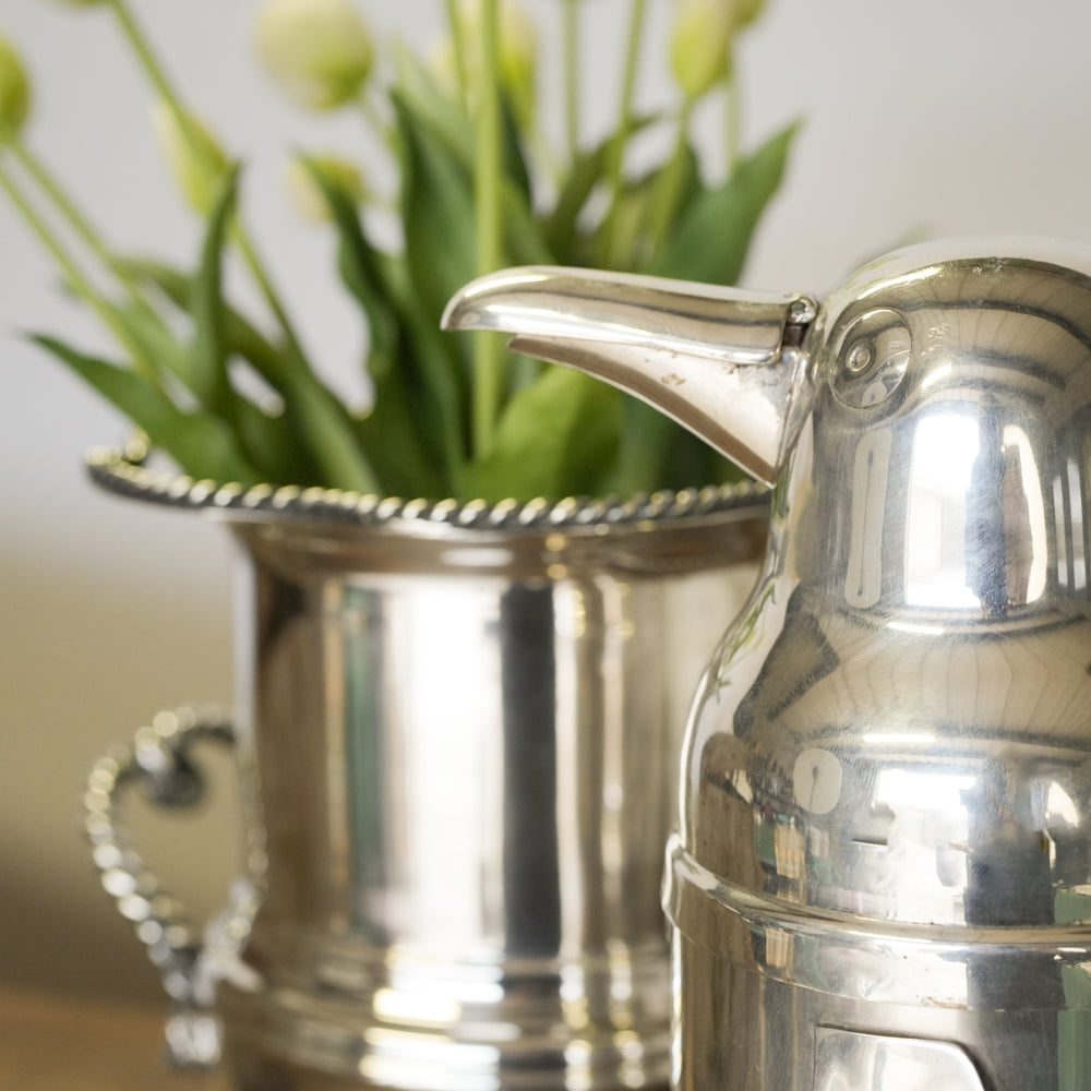 Iconic silver mid-century wine holder
