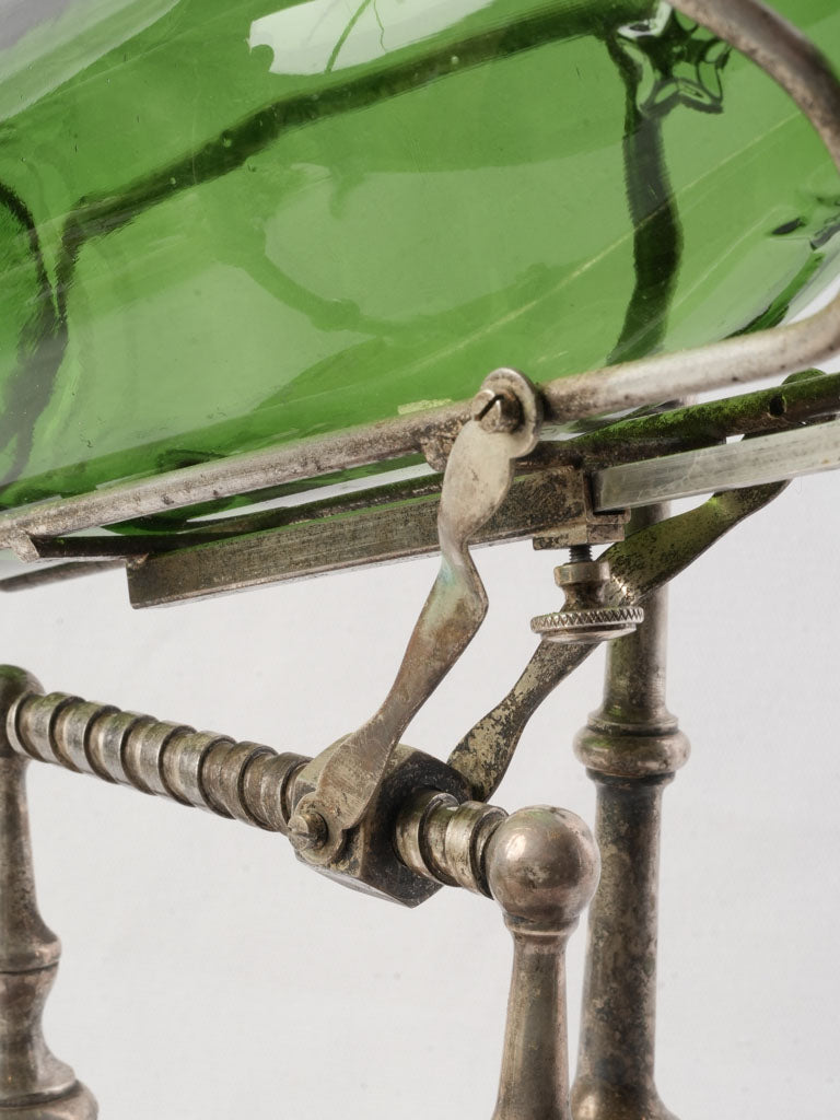 Collectible mechanical wine decanting cradle