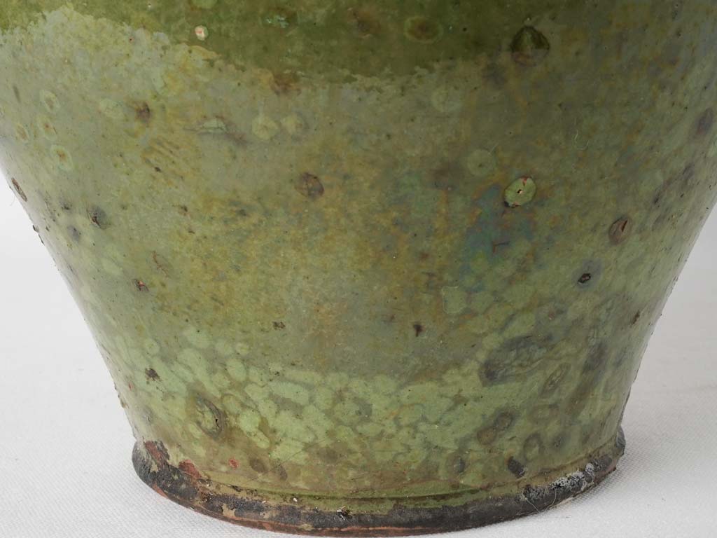 Time-worn water-fetching large clay pitcher