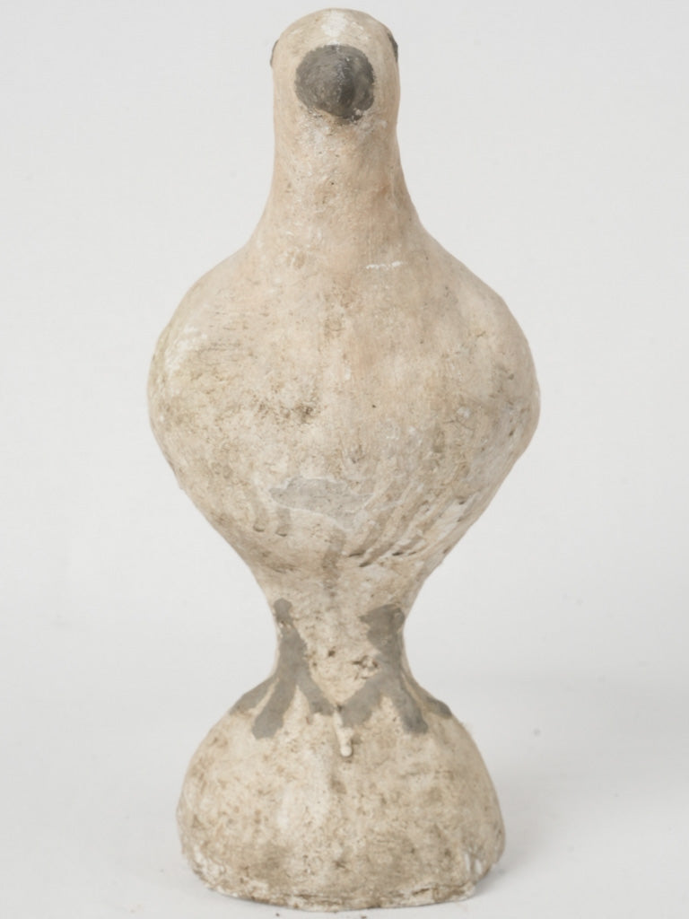 Serene vintage cement pigeon figurine