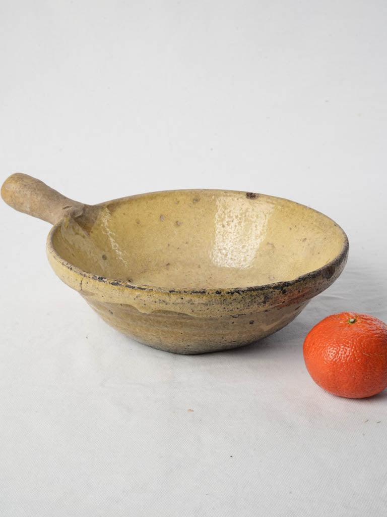 Vintage yellow-glazed terracotta bowl